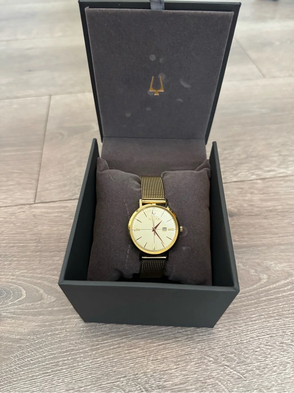 Bulova ladies gold-tone mesh watch with champagne dial